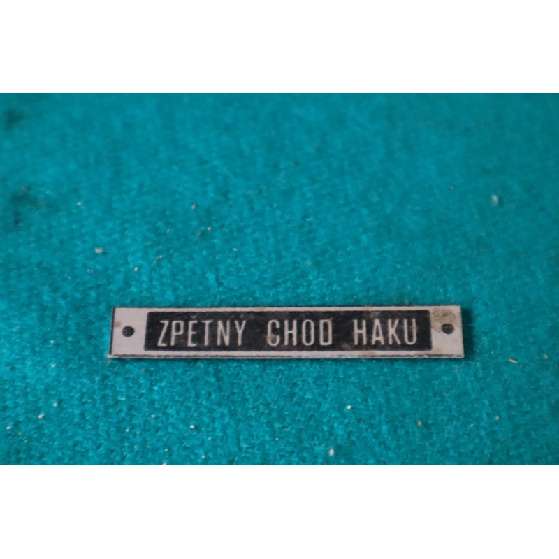 Štítok spätný chod háku